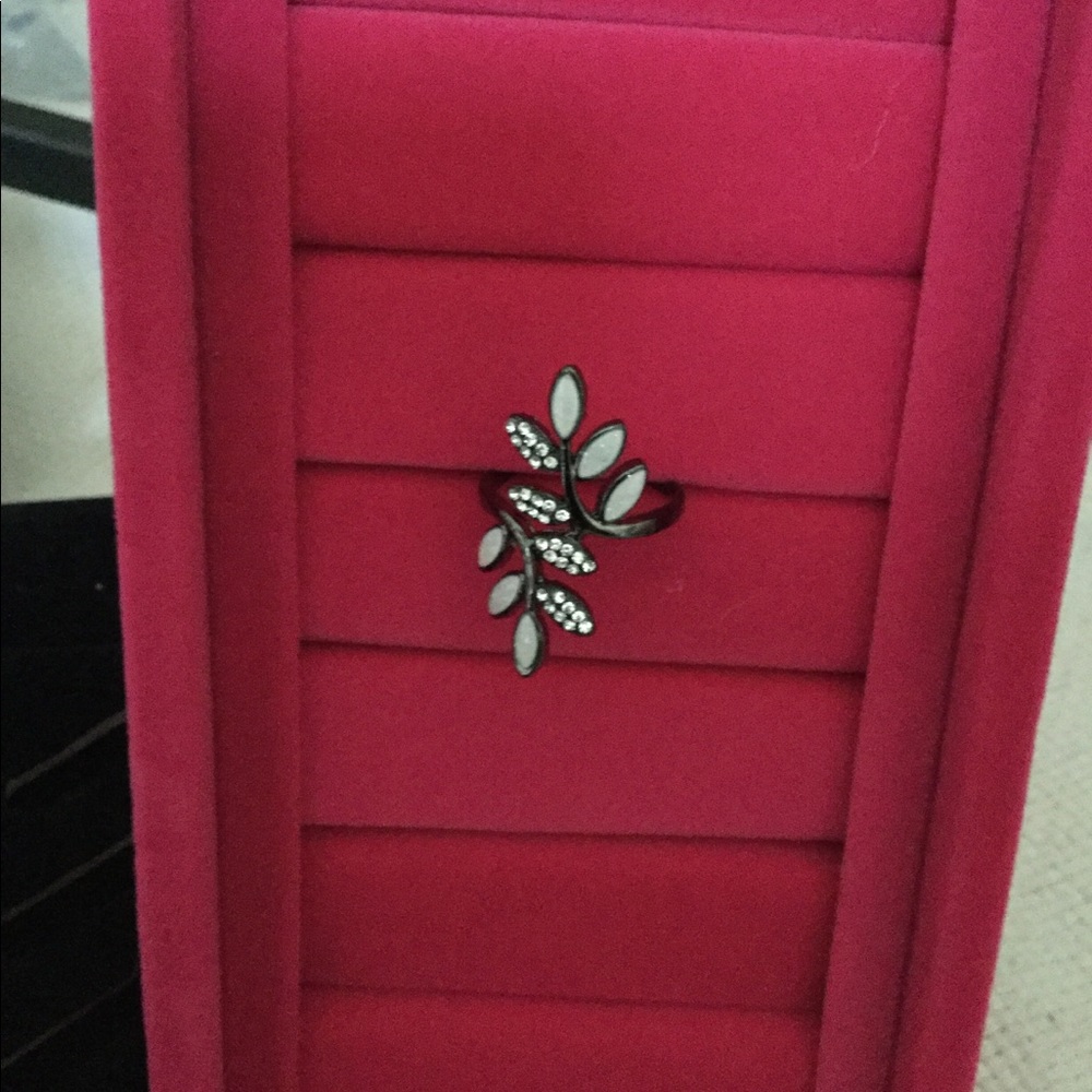 Stainless steel ring with opal and gemstones